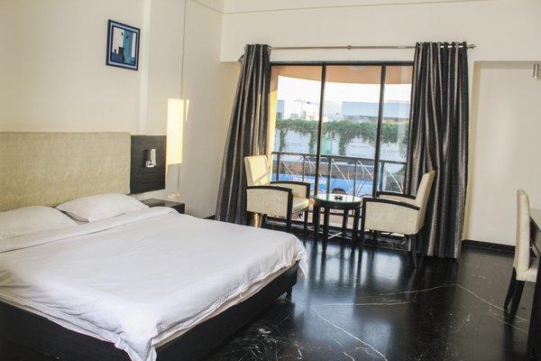 Hotel Aristro Lonavla Zimmer foto